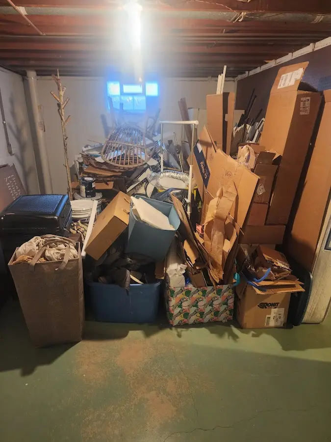 Roll-off dumpster container at job site for 2 Yard Dumpster Rental in Liberty